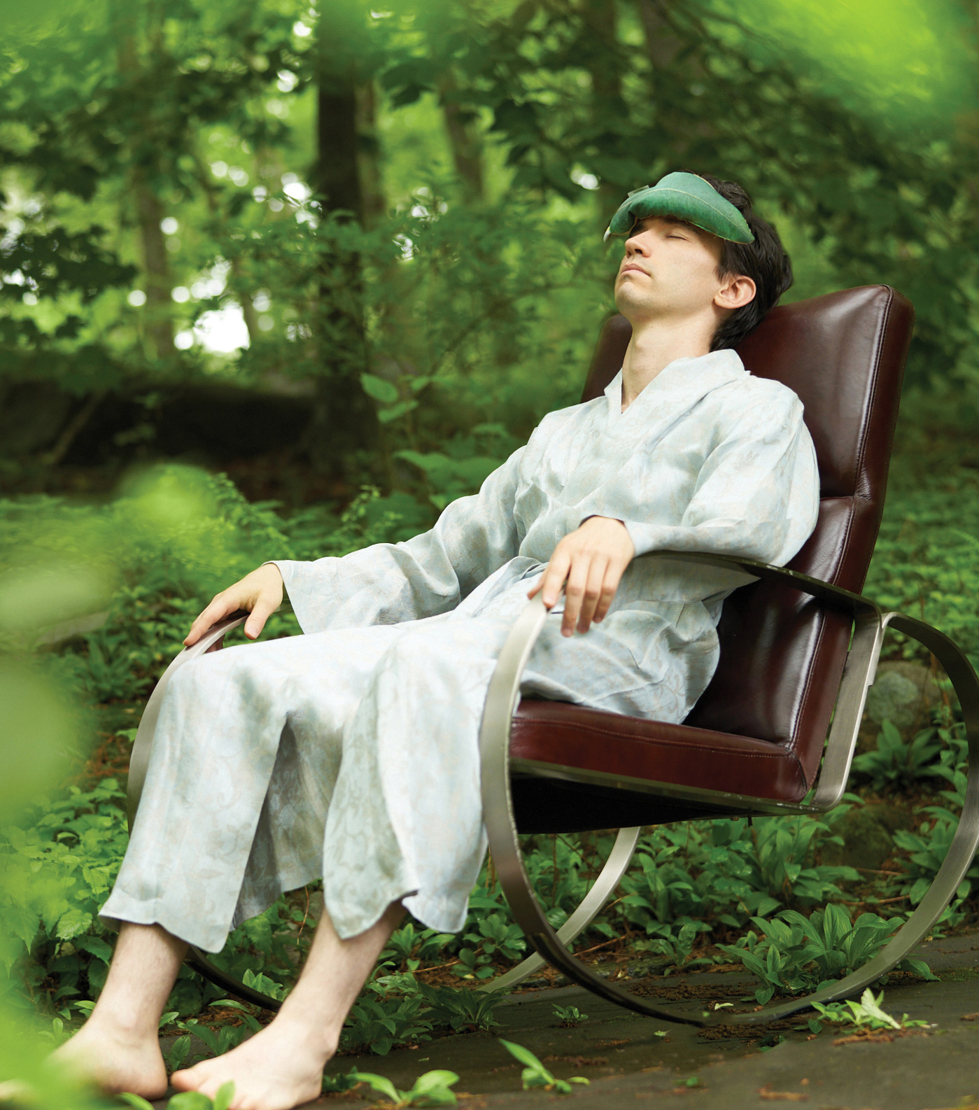 man relaxing in the peaceful woods and nature