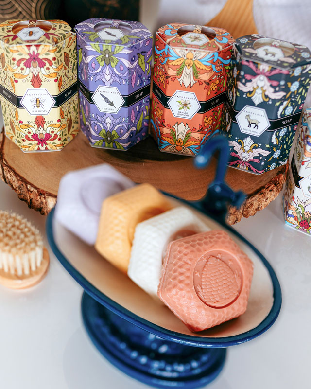 new quartet honey soap packaging with four bars in lavender, pure honey, orange blossom, and goat milk fragrances